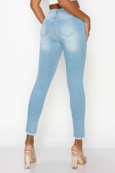 Leah - Pantalones ajustados de gran altura con dobladillo deshilachado destruido